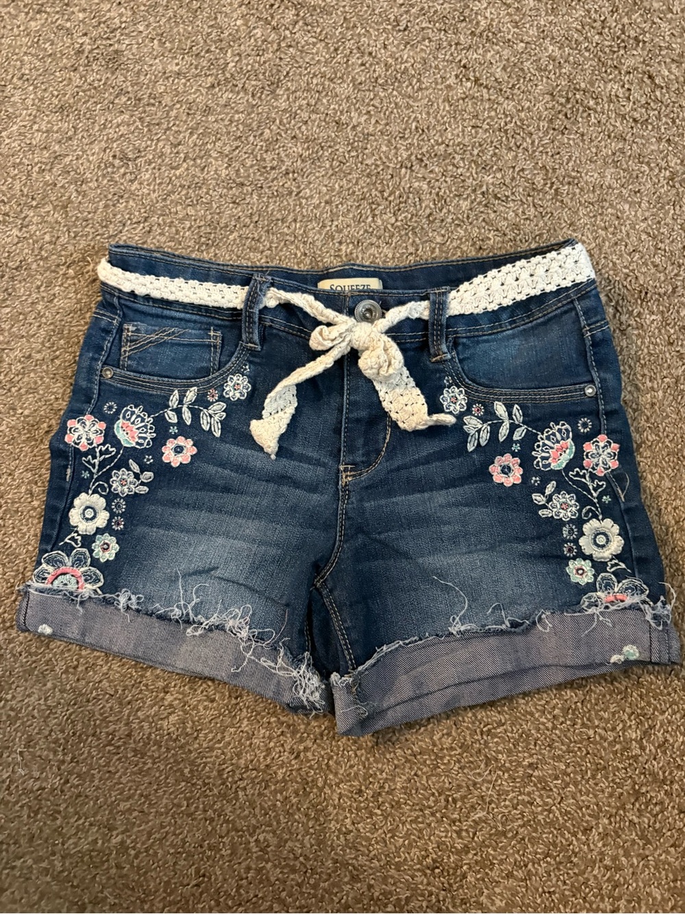 Squeeze Dark Blue Denim Shorts with Floral Embroidery and Cream Crochet Belt